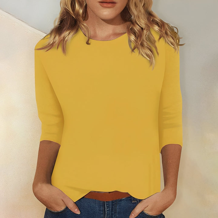 T-shirt femme casual à manches 3/4, parfait pour un style décontracté et aéré au printemps-été.