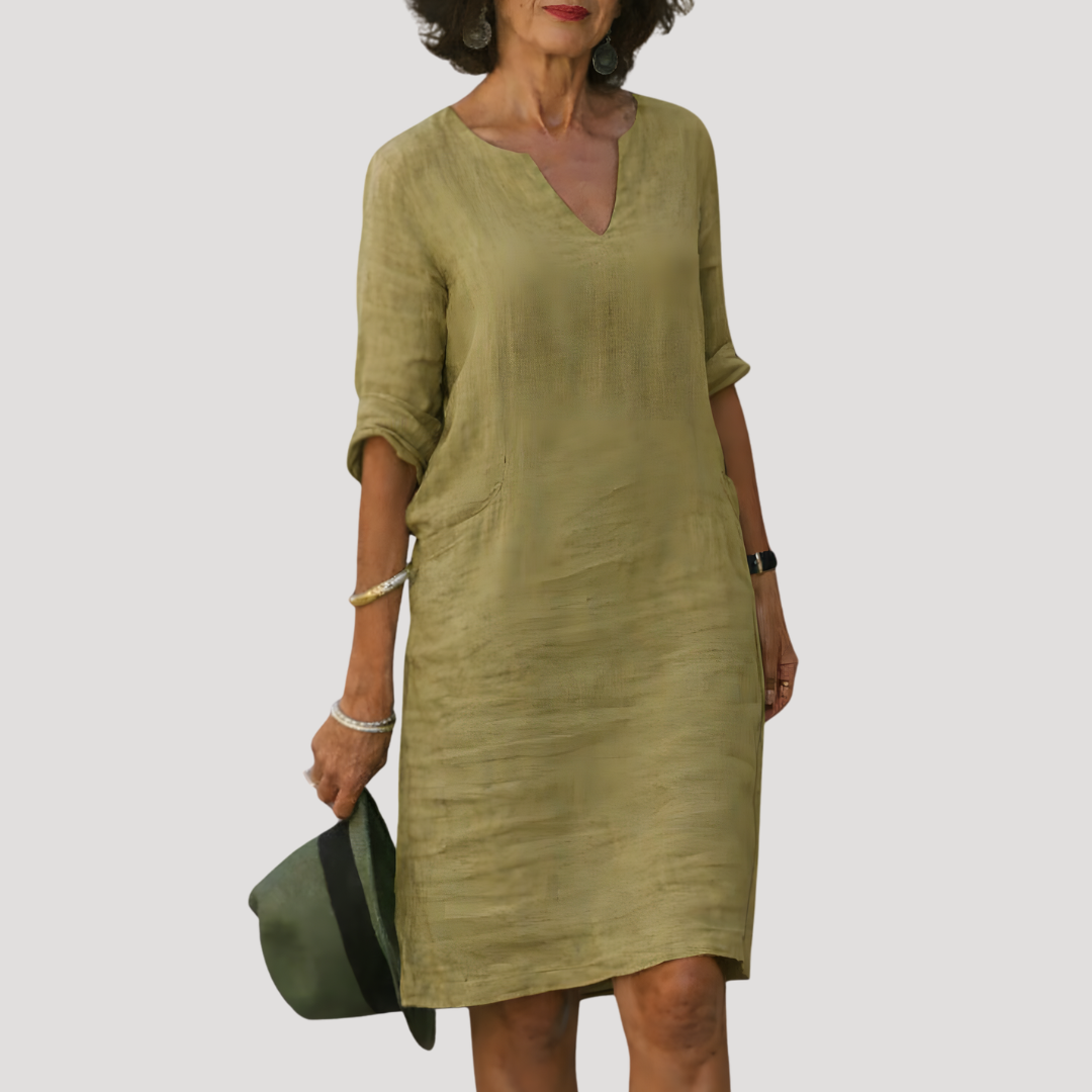 Robe midi femme chic et confortable pour printemps-été. Vêtement fluide élégant, idéal pour un look décontracté polyvalent.