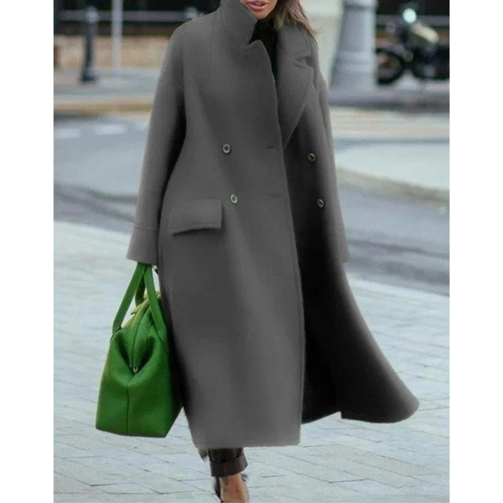 Manteau femme long double boutonnage, style structuré et chic. Parfait pour l'hiver, mode féminine élégante.
