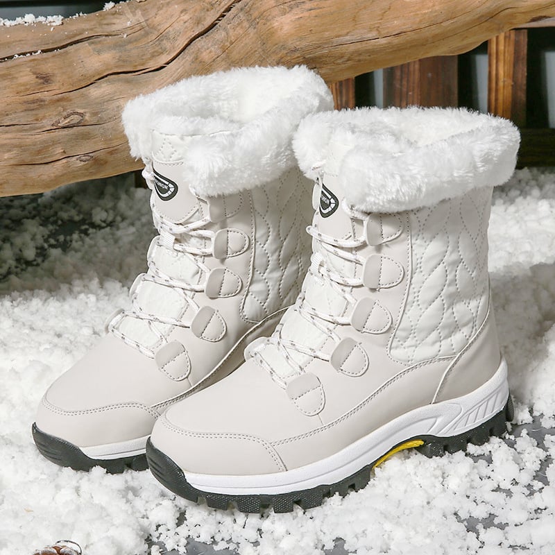 Élégantes bottes de neige femme, imperméables et chaudes, avec un design moderne. Idéales pour l'hiver urbain.