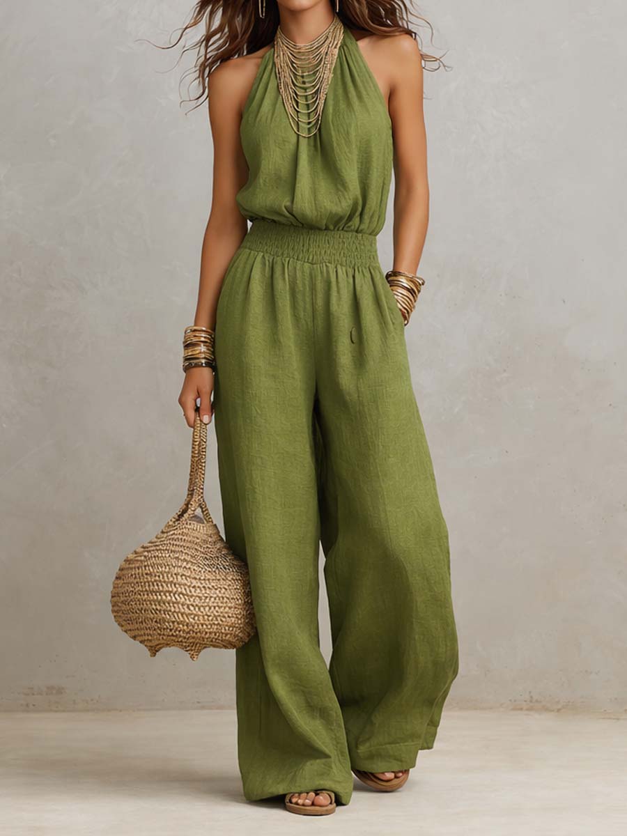Combinaison fluide femme halter élégante à jambes larges. Idéale pour un été chic et décontracté.