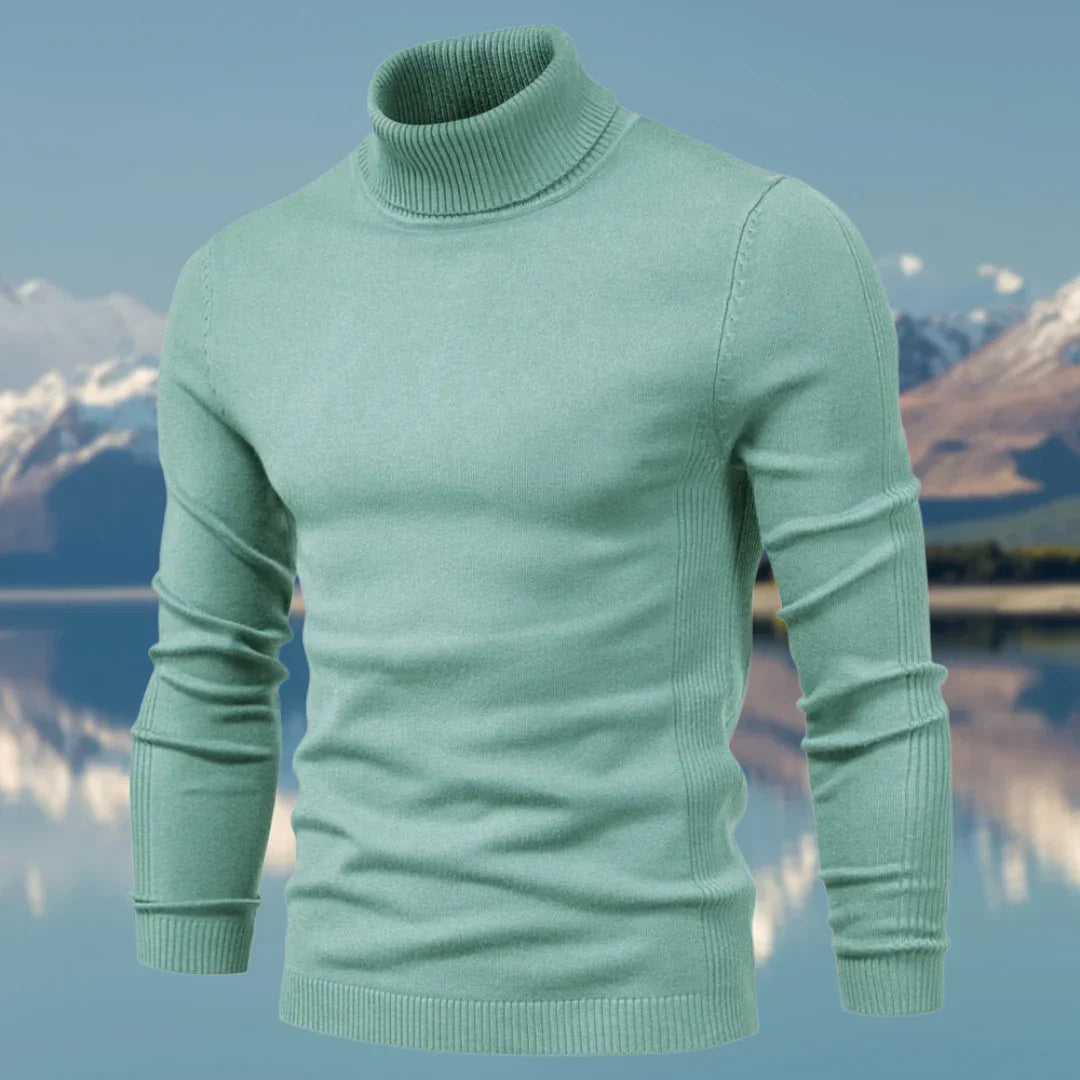 Détail du col roulé sur un pull homme, démontrant la texture chaude et la finition élégante.