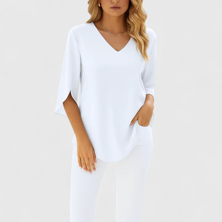 Top femme chic et confortable, blouse décontractée idéale pour printemps/été, look moderne et raffiné.