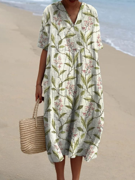 Robe d'été femme, imprimé floral éclatant, confort et élégance pour toutes occasions estivales.