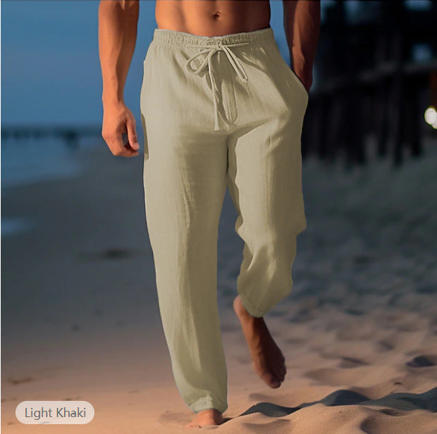Gros plan sur la taille élastique et le cordon du pantalon de plage homme en lin. Confort optimal.