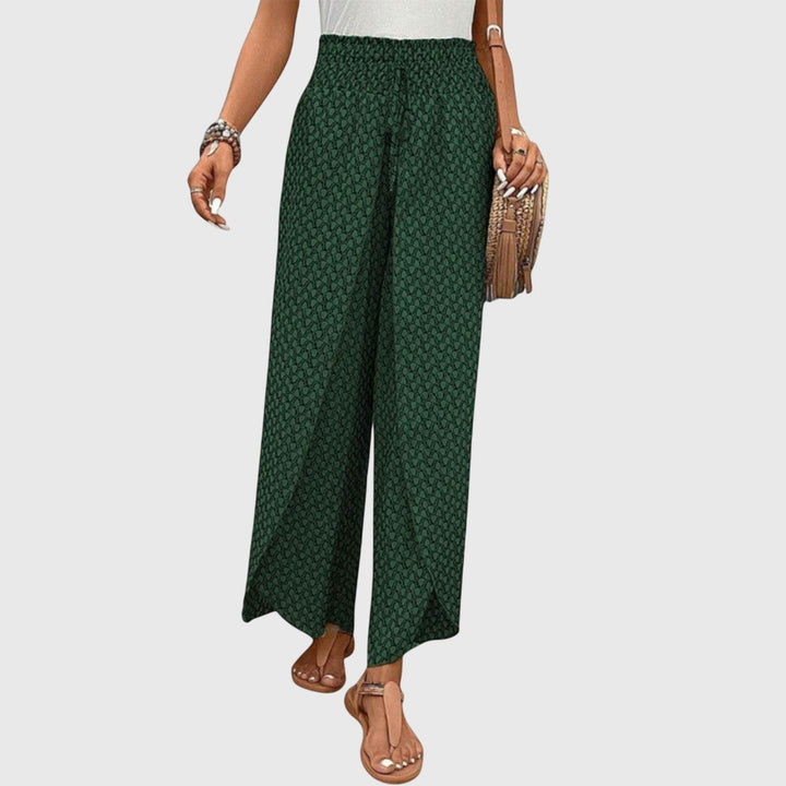 Pantalon palazzo femme en tissu fluide, taille haute. Confort et élégance décontractée parfaits.