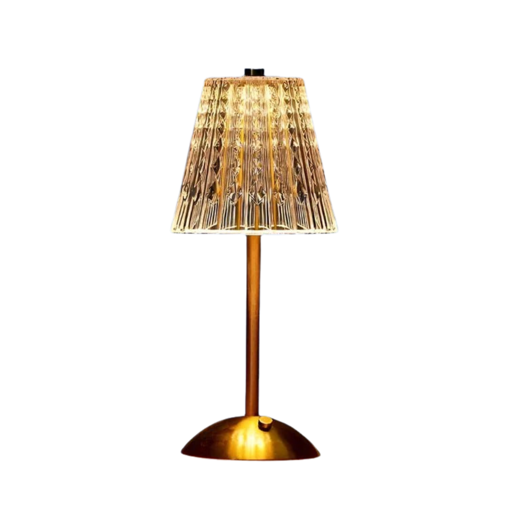 Lampe de table design LED sans fil. Cristal transparent et métal, accent lumineux pour une décoration contemporaine.
