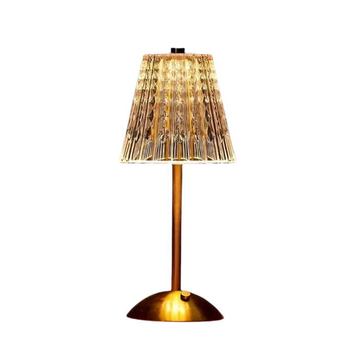 Lampe de table design LED sans fil. Cristal transparent et métal, accent lumineux pour une décoration contemporaine.