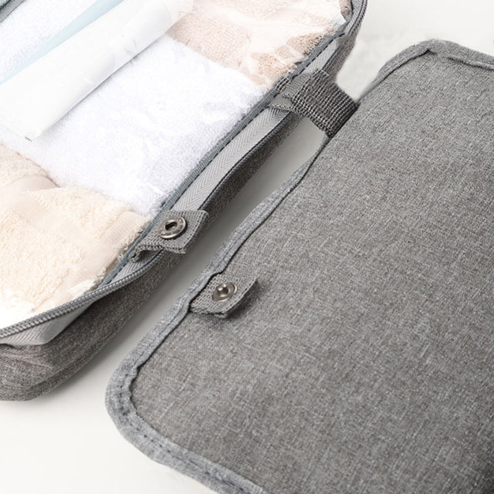 Trousse de voyage pour cosmétiques, design unisexe, résistante à l'eau, parfaite pour tous vos déplacements.
