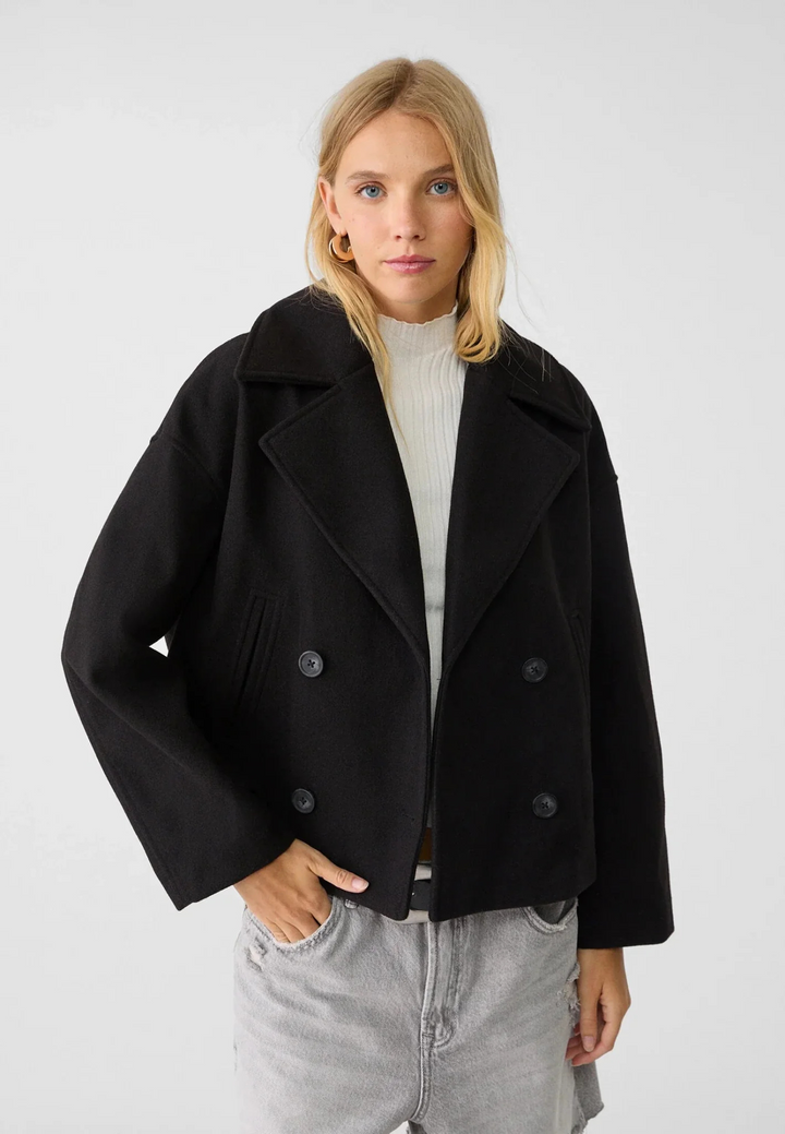 Veste courte chic et polyvalente femme, tailleur moderne, idéale bureau et loisirs.
