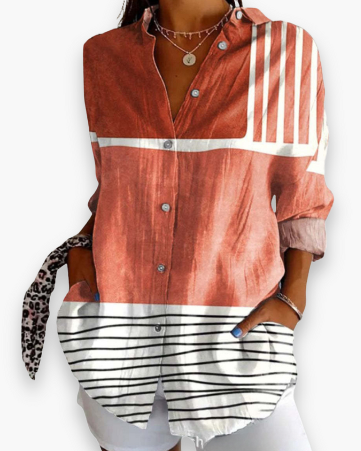 Blouse imprimée femme, élégance intemporelle pour le bureau ou les sorties. Vêtement confortable et stylé.