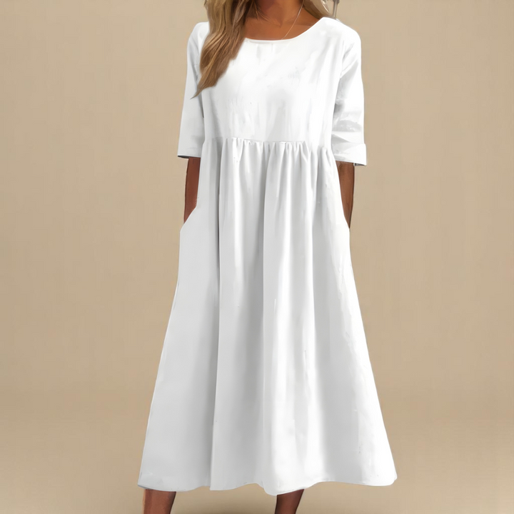 Robe longue femme grande taille en coton ample, offrant un confort optimal et élégance estivale.