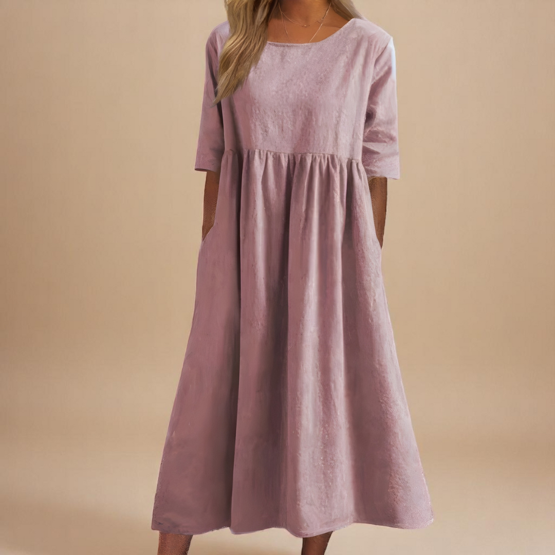 Robe longue femme estivale en coton, design ample et décontracté, essentielle pour votre garde-robe.