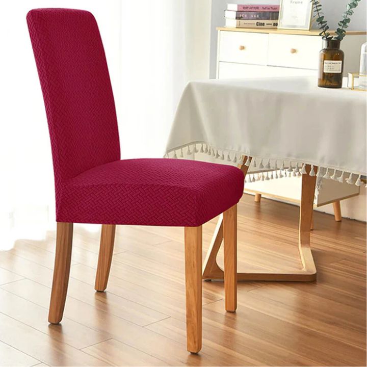 Housse de chaise élastique en polyester stretch vert, protection imperméable pour relooking de salle à manger.