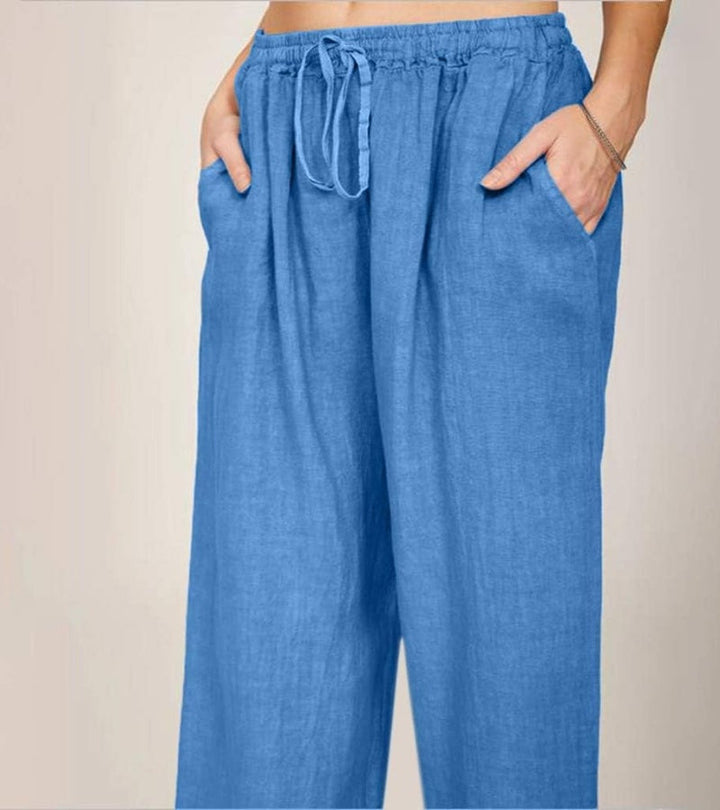 Pantalon femme noir en lin, coupe large, taille haute, vêtement décontracté chic pour l'été.