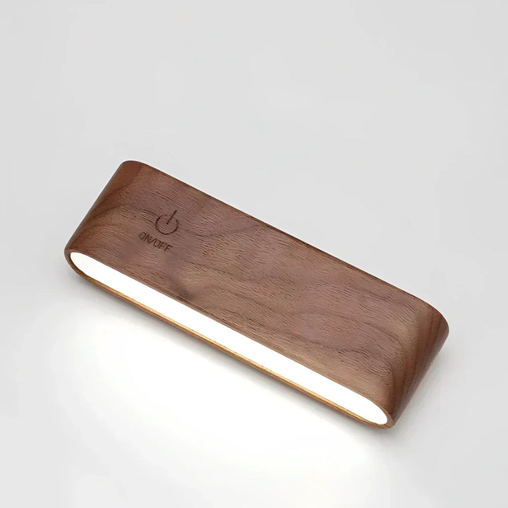 Lampe LED moderne, dimmable et sans fil, fixation magnétique pour une décoration intérieure élégante.