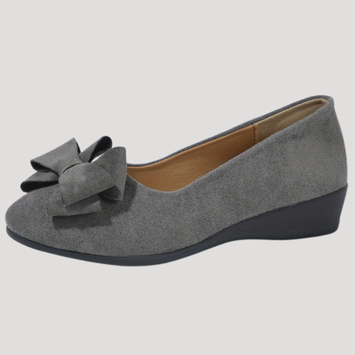 Ballerines femme compensées, nœud délicat, alliant esthétique et confort pour la marche.