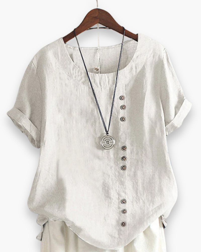 Top femme fluide et léger, boutonnée. Parfait pour un look décontracté chic mode printemps-été.
