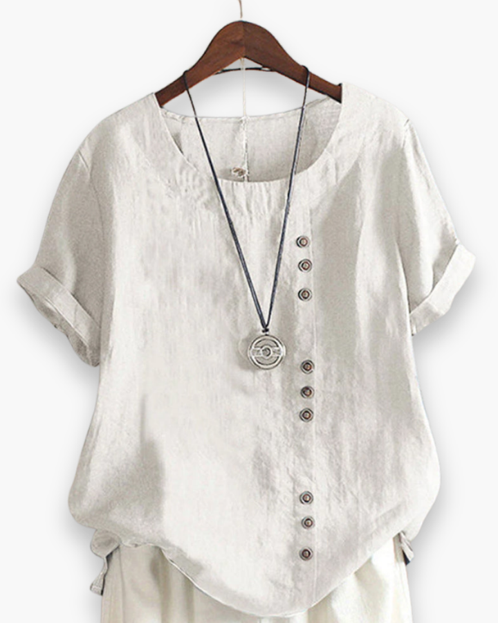 Top femme fluide et léger, boutonnée. Parfait pour un look décontracté chic mode printemps-été.