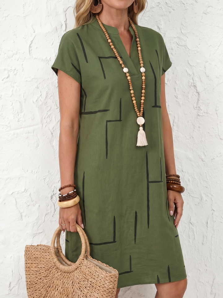 Robe midi confortable femme en coton lin, imprimé géométrique tendance, col en V, style estival élégant.
