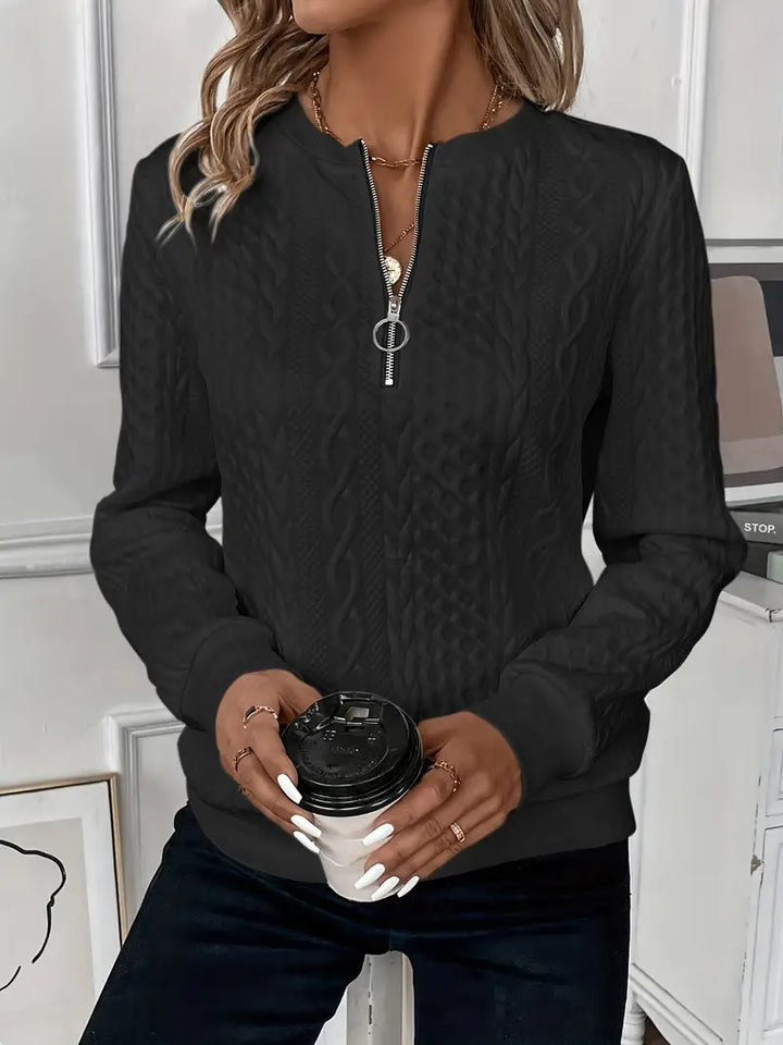 Chandail femme confortable, style intemporel, facile à associer pour une tenue élégante.