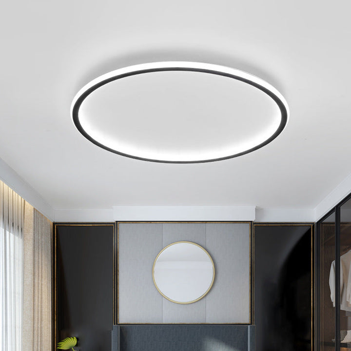 Lampe LED de plafond moderne et ronde, design scandinave minimaliste, idéale pour tout intérieur.
