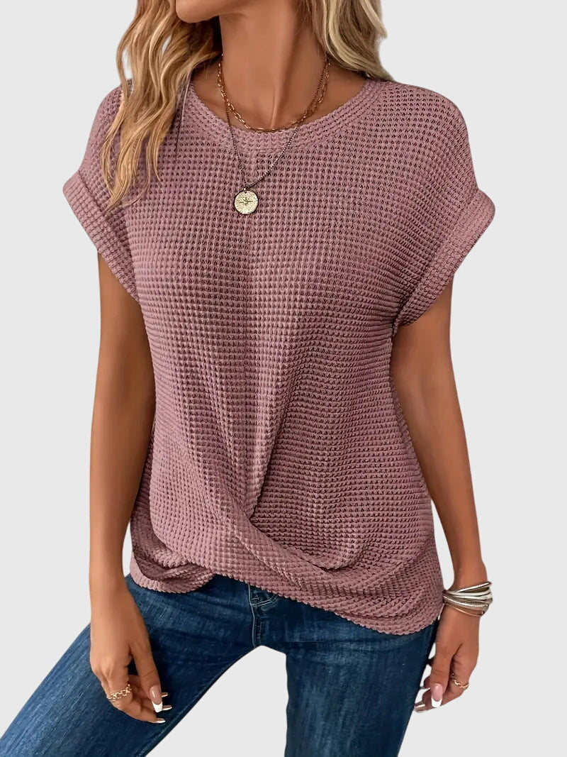 Blouse chic intemporelle femme à col rond, idéale pour une tenue élégante et confortable au quotidien.