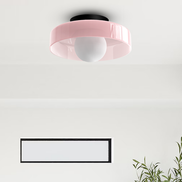 Plafonnier LED rond, style moderne, pour un éclairage doux et efficace.