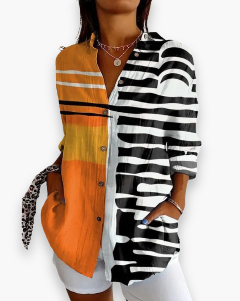 Haut femme chic imprimé, idéal pour printemps et été. Style moderne et habillé, parfait pour la mode féminine.