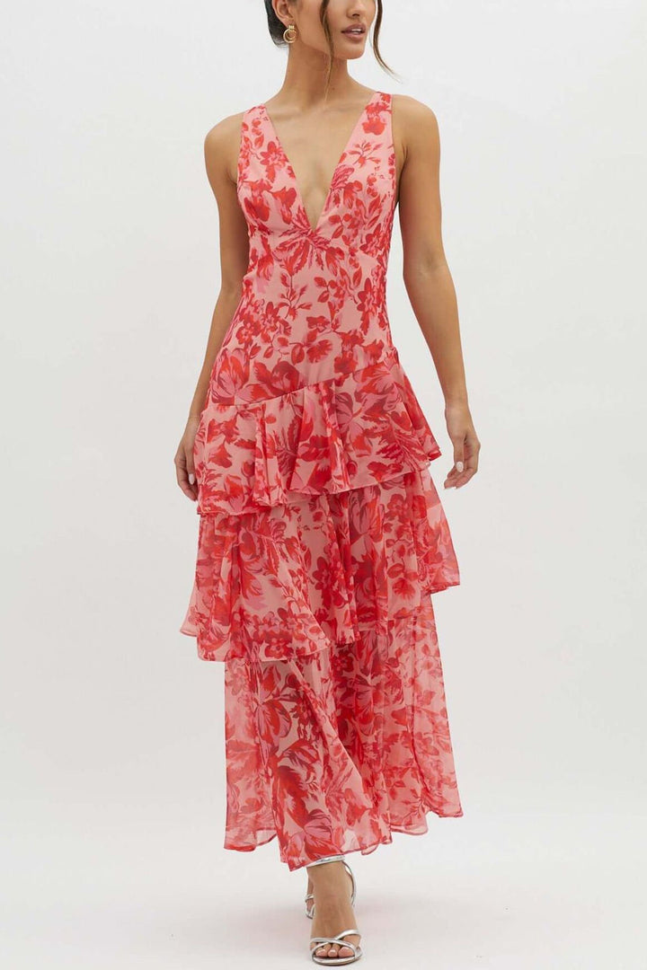 Magnifique robe florale élégante pour femme avec volants sophistiqués, coupe longue et féminine.