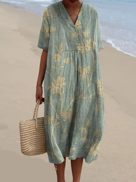 Robe florale femme, été, coupe ample, motifs joyeux, parfaite pour une allure décontractée et confortable.