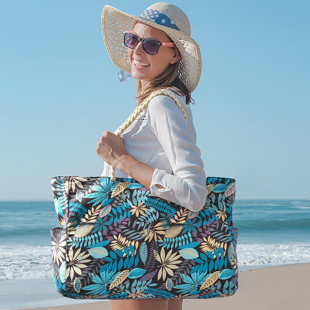 Sac de plage spacieux pour femme, imprimé feuilles. Idéal pour transporter vos affaires en vacances.