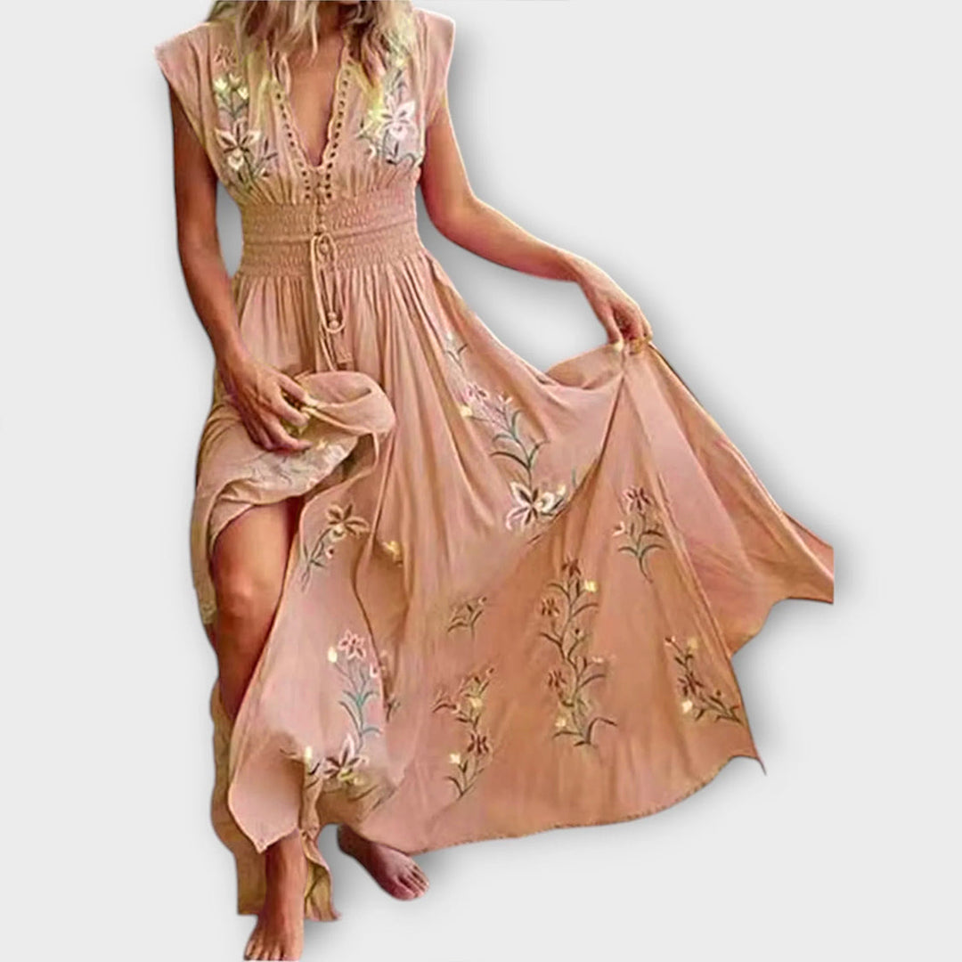 Robe Felizia brodée pour femme, style bohème romantique, idéale pour les journées d'été élégantes.