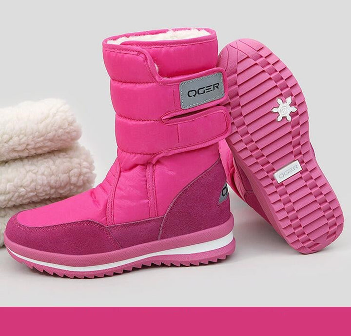 Bottes imperméables pour femmes, style moderne, parfaites pour l'hiver, la pluie, assurant chaleur et adhérence.