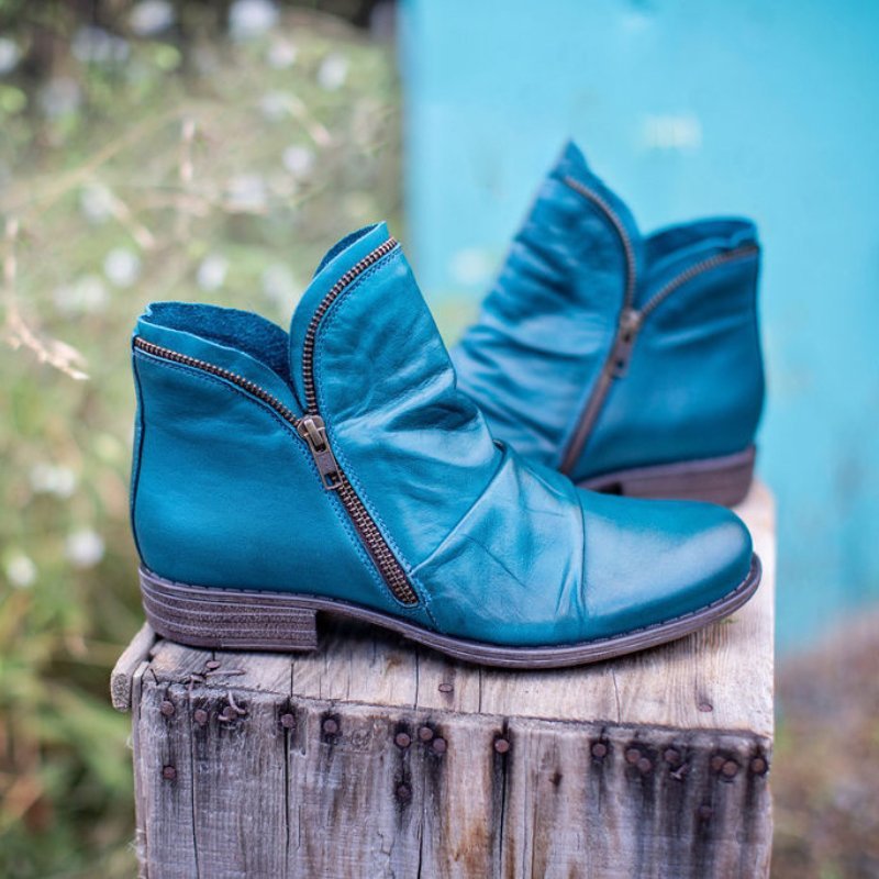 Chaussures bottines femme mode, élégantes et confortables. Parfaites pour l'hiver, fermeture éclair pratique.