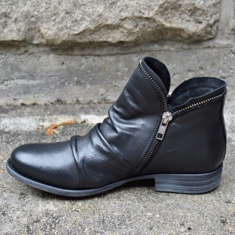 Bottines femme élégantes, avec fermeture éclair. Tendance et chic, idéales pour vos tenues d'automne-hiver.