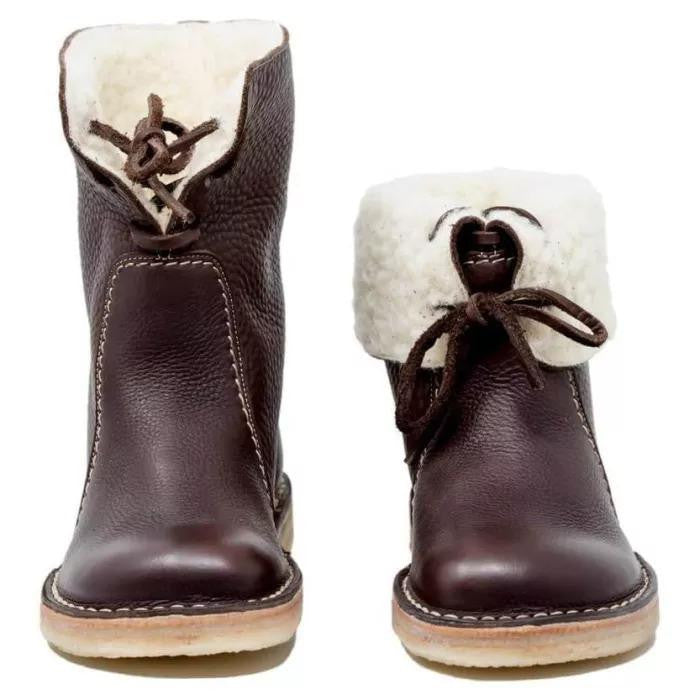 Bottes femme mode, chaudes et imperméables, pour rester chic et au sec tout l'hiver.