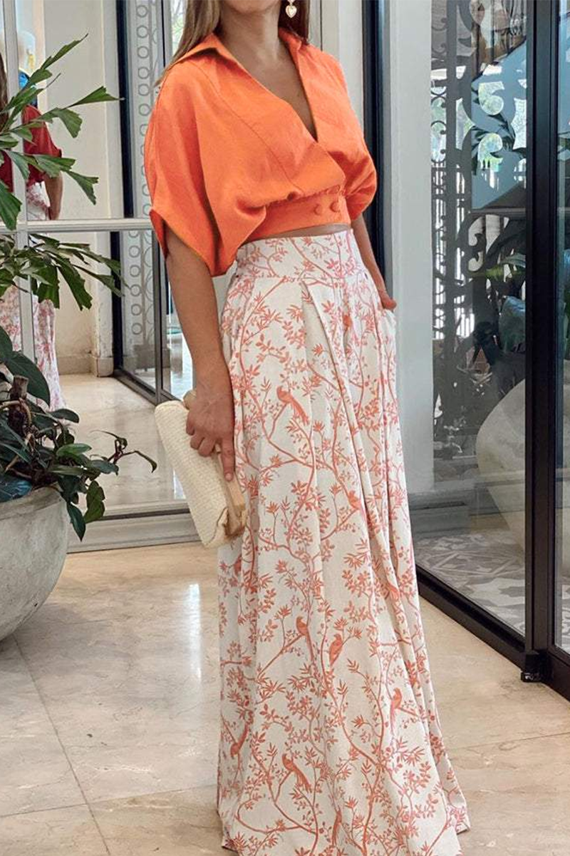 Tenue femme moderne deux pièces: pantalon palazzo décontracté et chic, blouse à manches bouffantes pour événements.