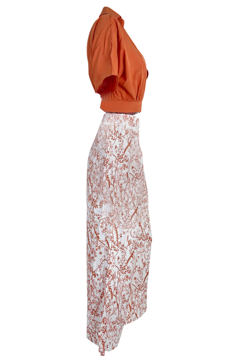 Tenue décontractée chic femme: ensemble deux pièces avec pantalon palazzo et haut confortable à manches bouffantes.
