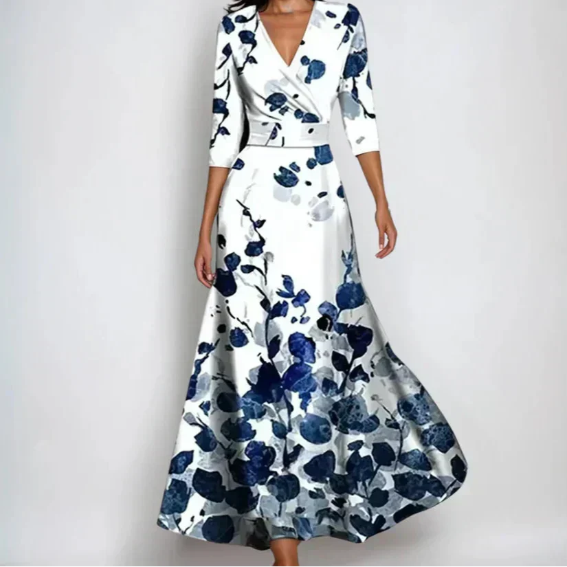 Robe longue fluide pour femme, motif floral printanier, allie élégance et confort décontracté. Idéale été.