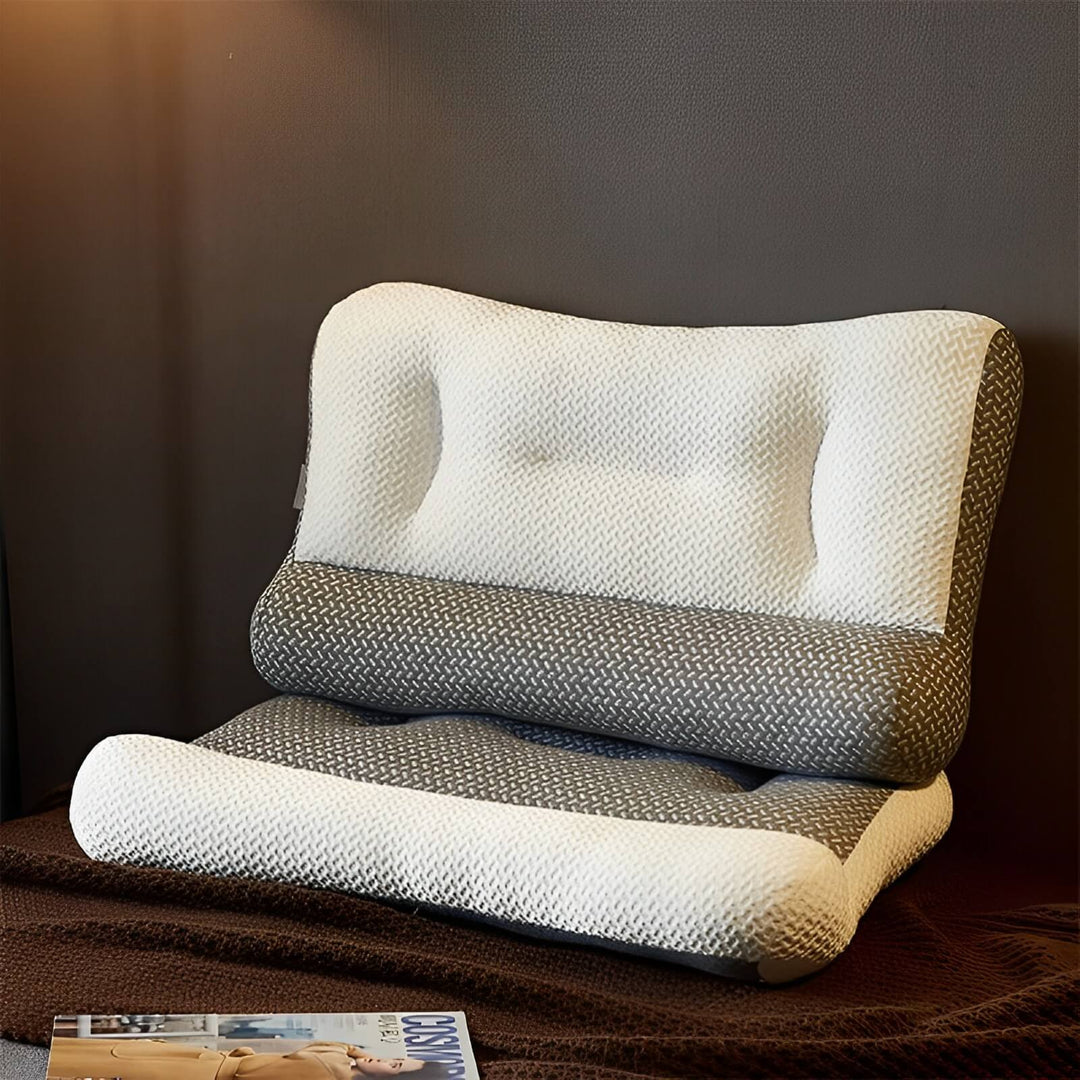 Coussin orthopédique gris pour un sommeil réparateur. Offre un confort optimal et réduit les douleurs de la nuque.