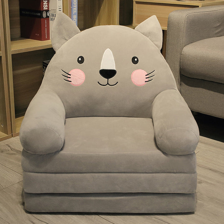 Petit canapé pliant pour enfants, en tissu doux, parfait pour lire ou se détendre. Chambre.