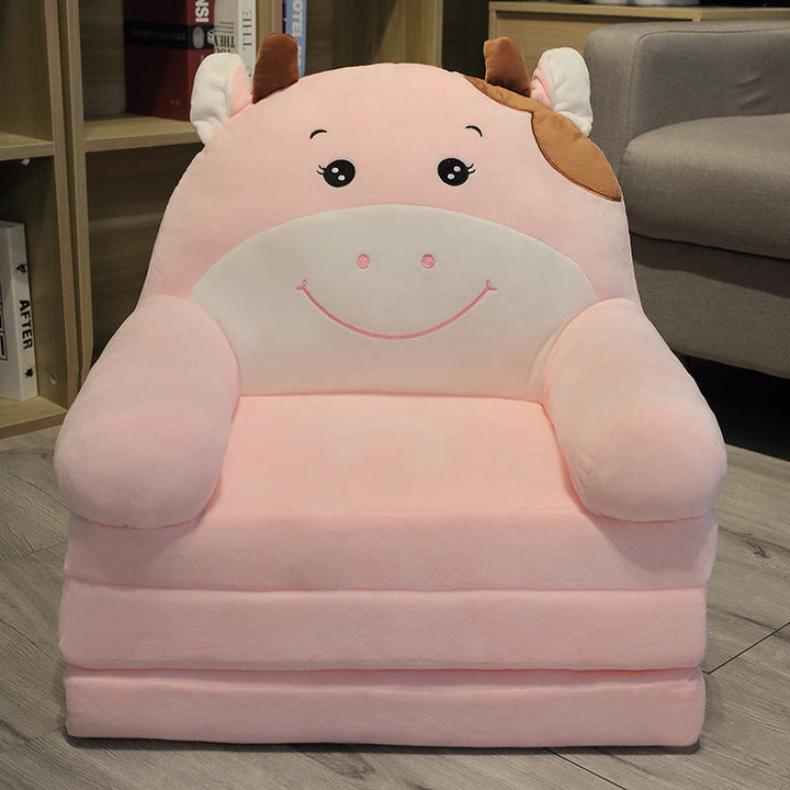 Canapé-lit enfant compact et léger en peluche, design moderne pour chambre ou salle de jeux.