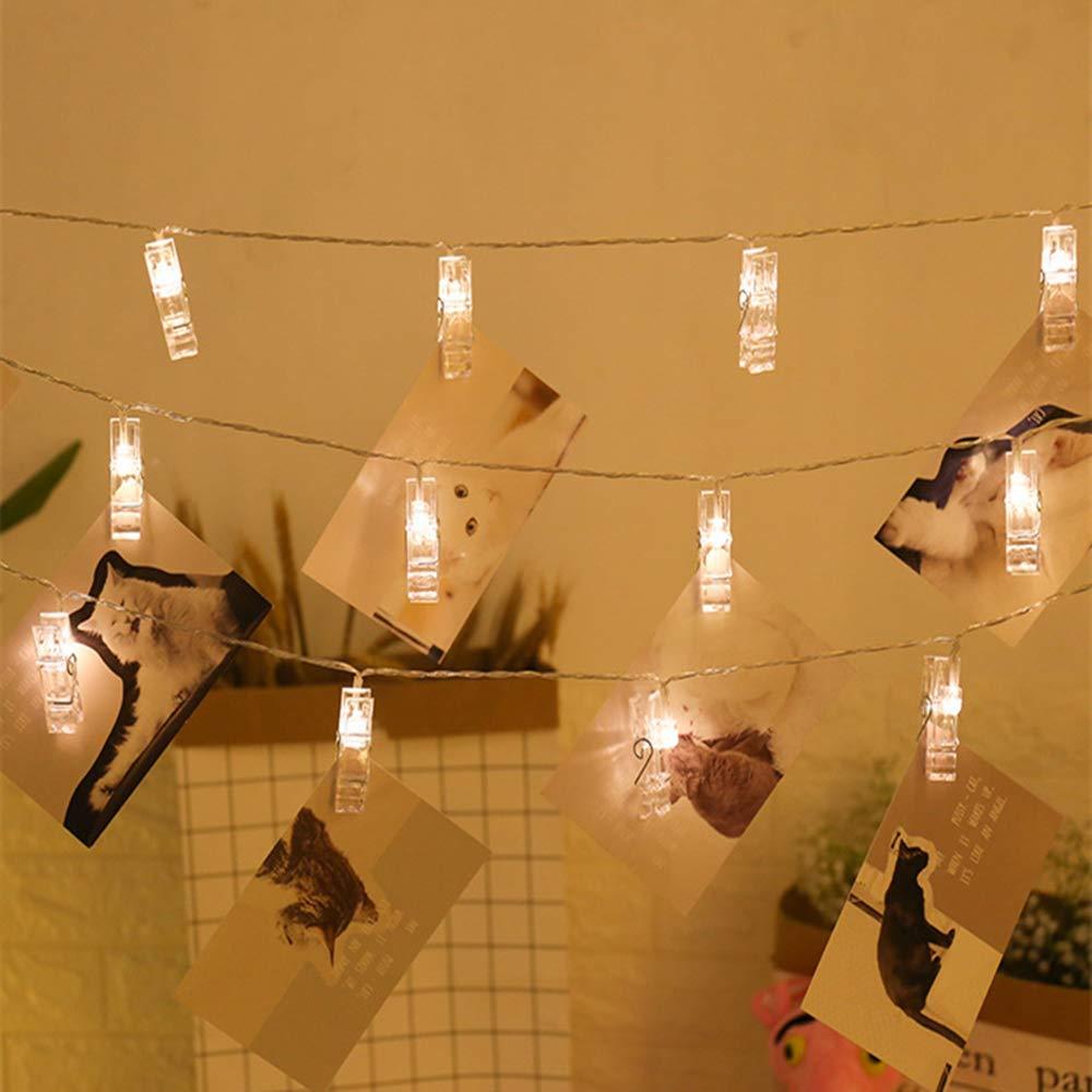 Illuminez vos souvenirs avec cette guirlande lumineuse LED à clips photo, parfaite pour la déco chambre.
