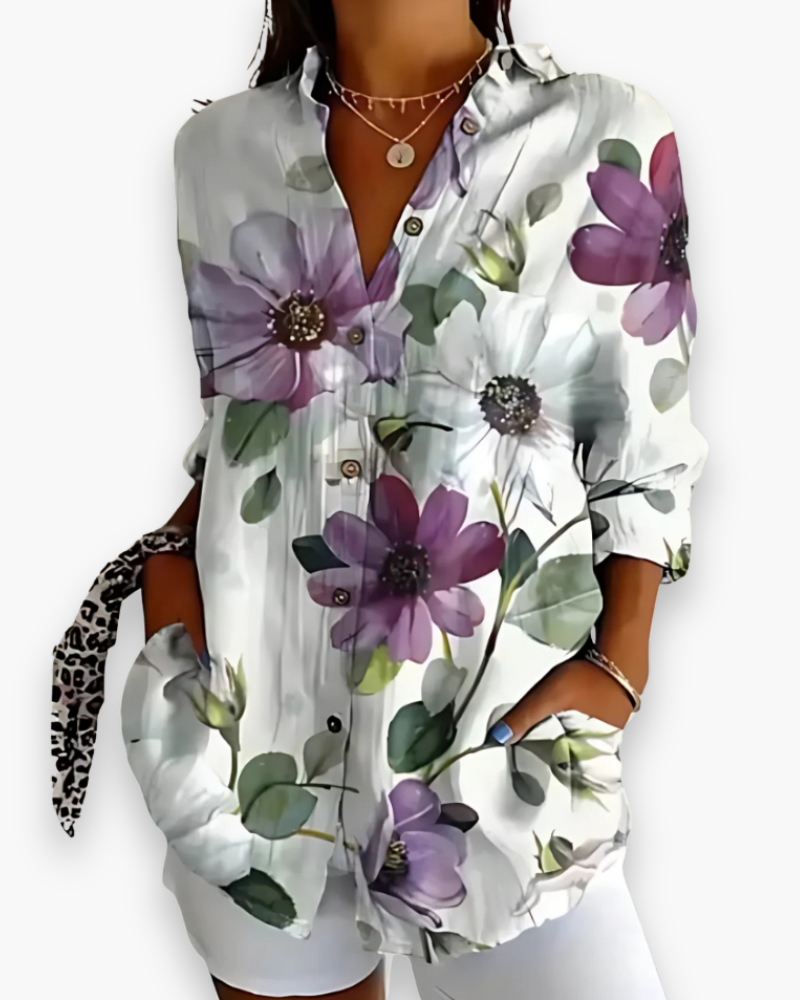 Blouse femme imprimée chic, coupe fluide et design élégant. Vêtement polyvalent pour toute occasion.