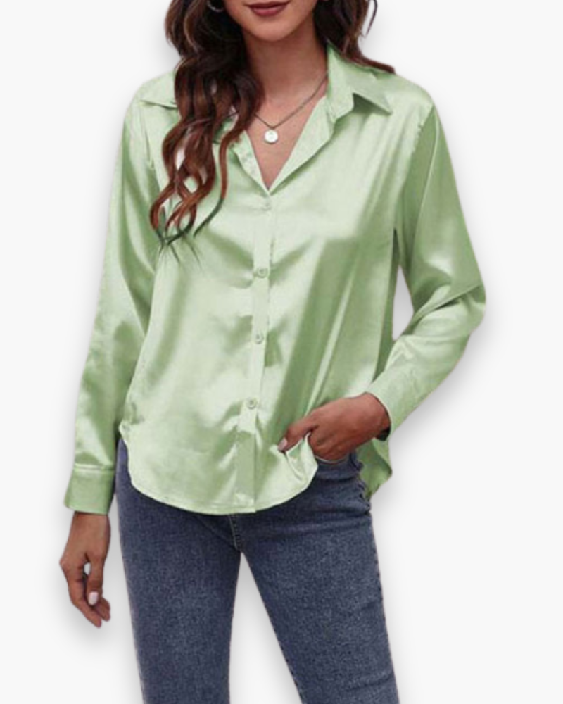 Blouse femme unie, coupe moderne, confortable et chic, parfaite pour les journées de printemps au bureau.