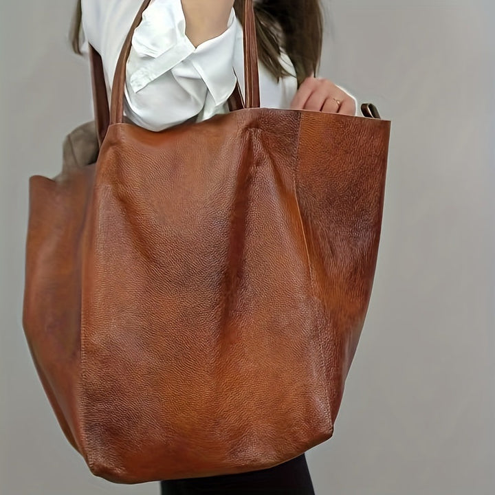 Grand sac tote souple pour femme, en simili cuir doux, alliant style élégant et confort quotidien.