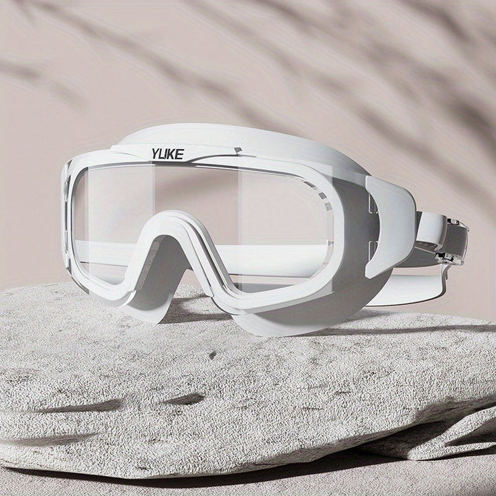 Lunettes de natation anti-buée HD avec protection optimale, confortables pour adultes en piscine ou eau libre.