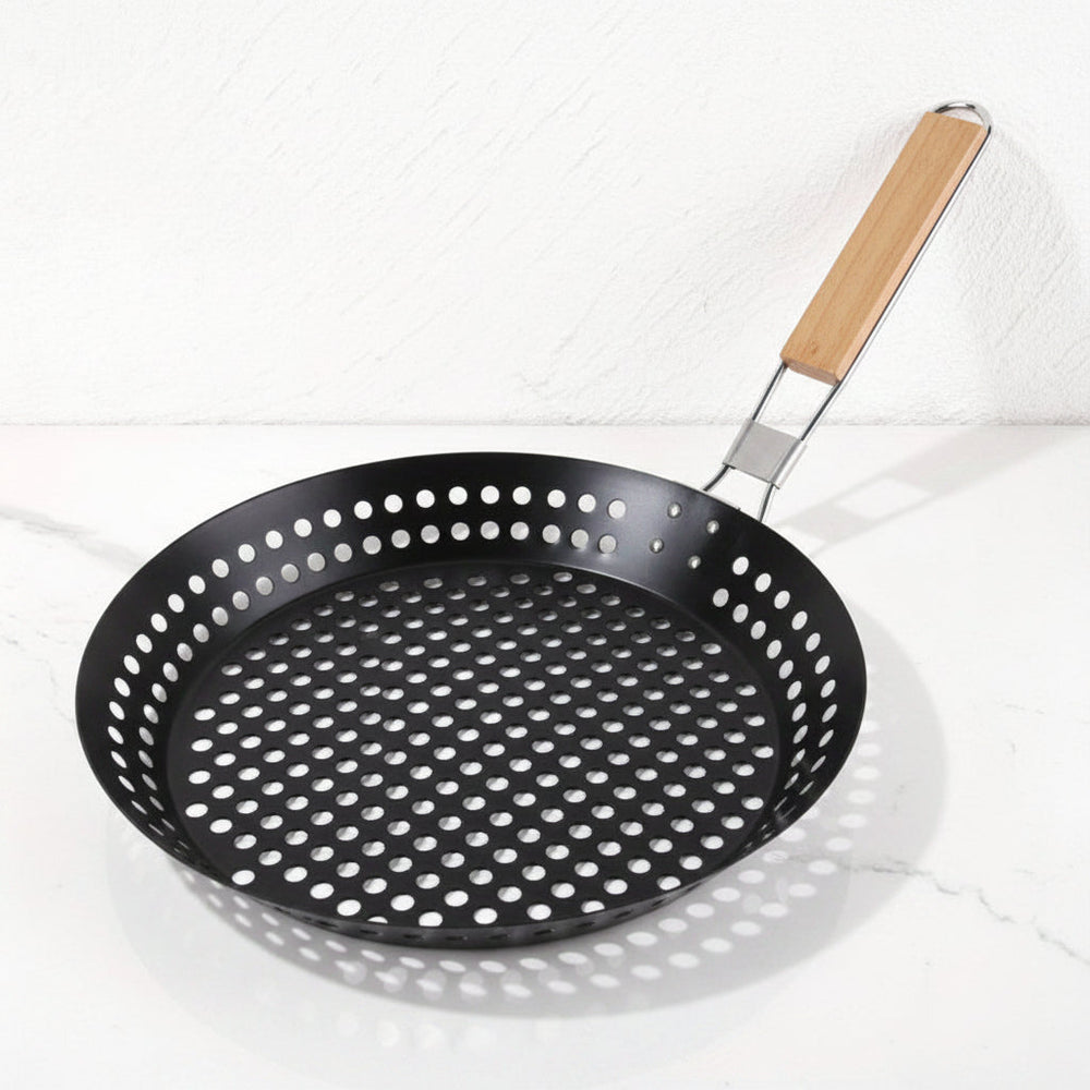 Poêle à griller portable en fonte antiadhésive, parfaite pour le camping et la cuisine en extérieur.