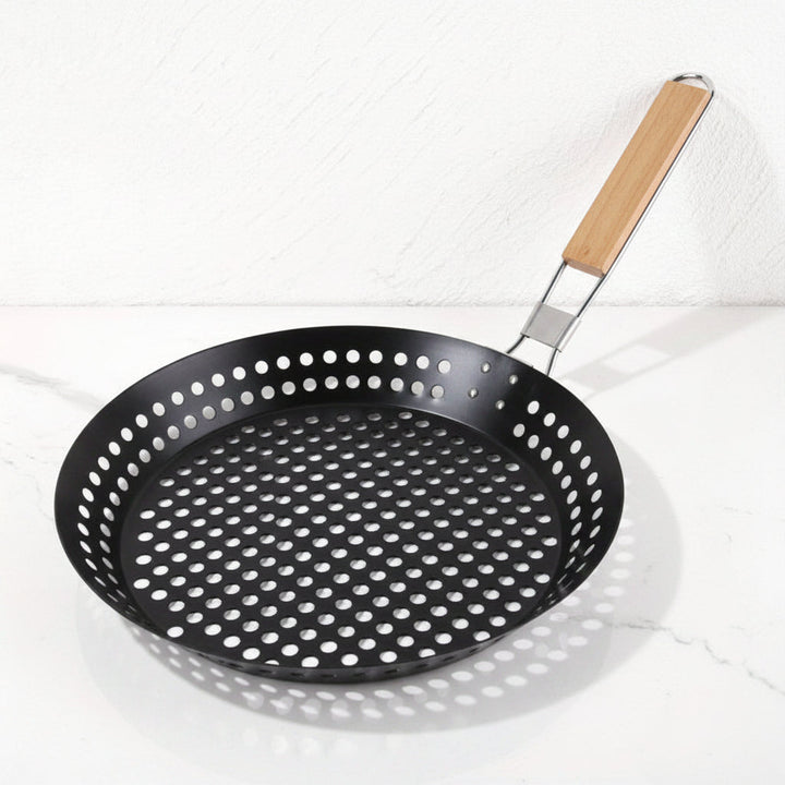 Poêle à griller portable en fonte antiadhésive, parfaite pour le camping et la cuisine en extérieur.